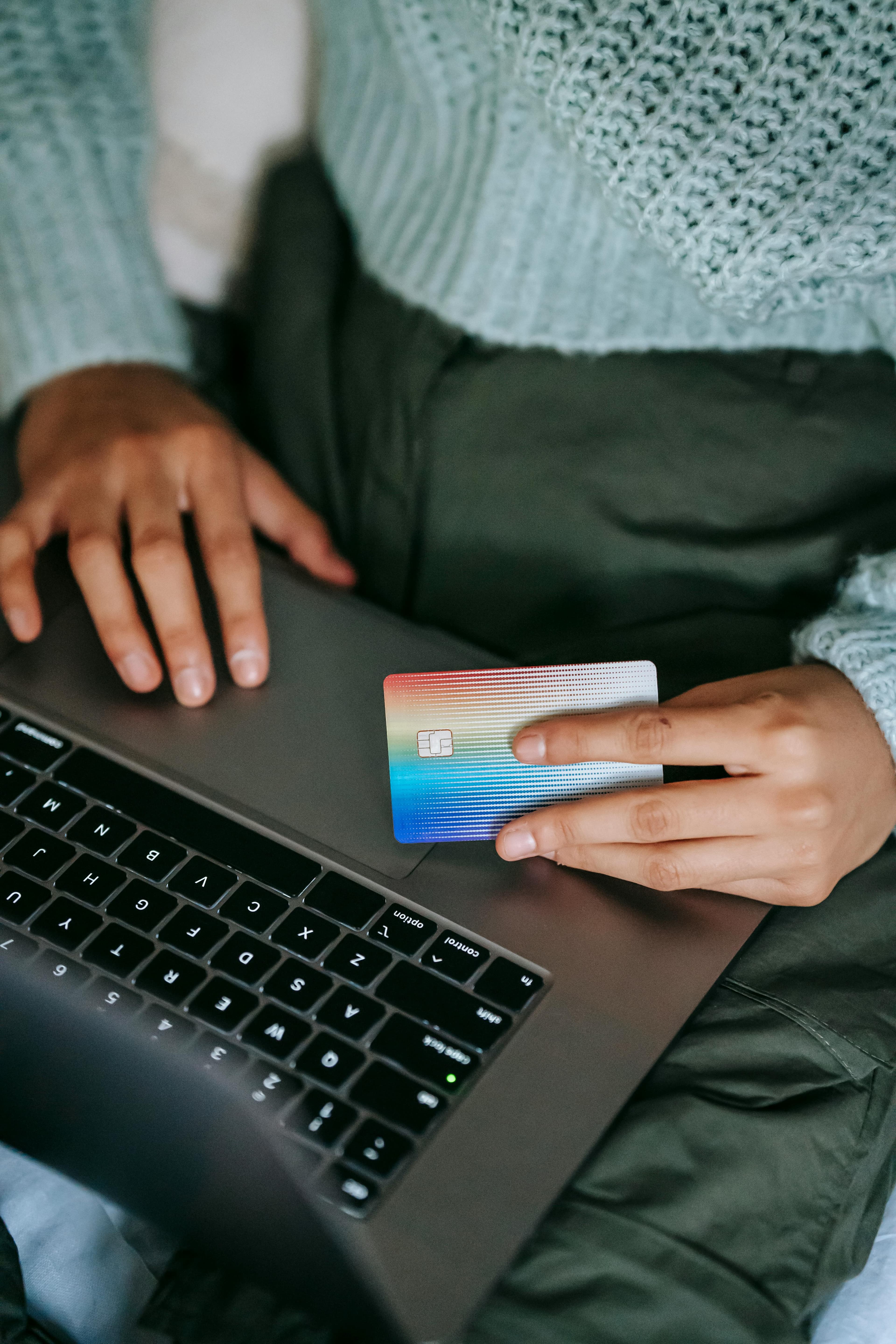 Lady with credit card and laptop